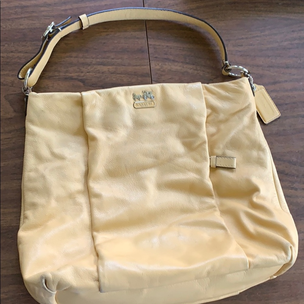 RESERVEDLight yellow Coach leather shoulder bag